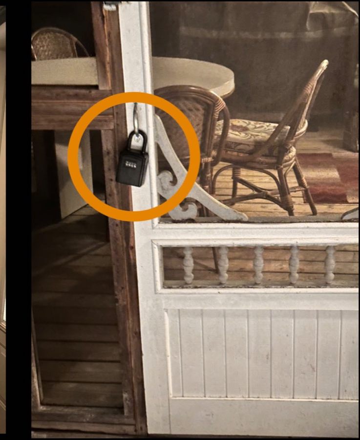 The lockbox on the porch railing